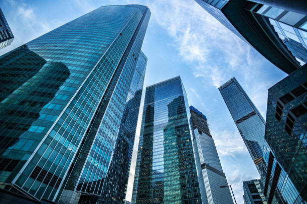 istock Corporate business building against blue sky 1214195084