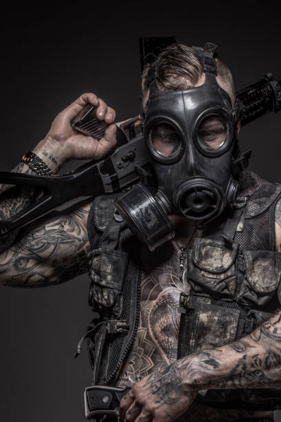 istock Military soldier wearing a gas mask 1214196144