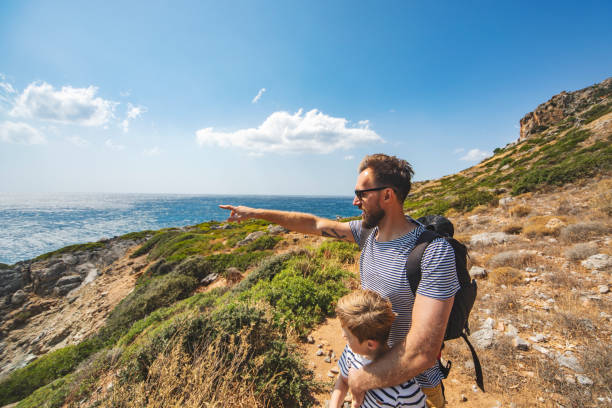 istock Father and son relaxing in Nature 1214196340