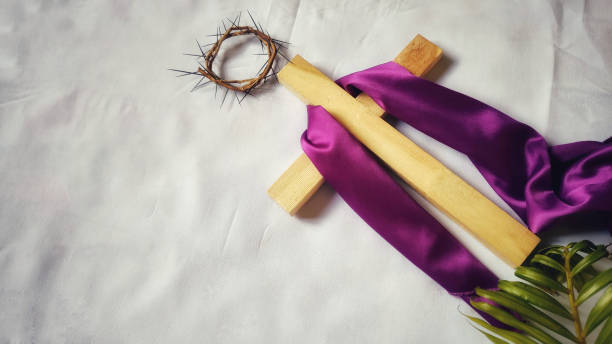 Lent Season,Holy Week and Good Friday concepts image of wooden cross with purple cloth on it lent stock pictures, royalty-free photos & images