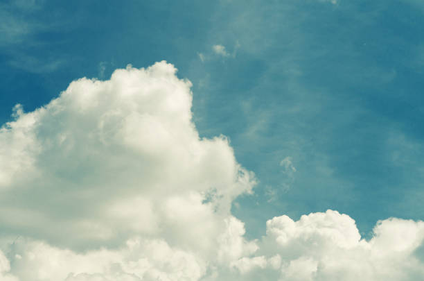 istock Incredibly wonderful lush cumulus clouds against a blue sky 1214199702
