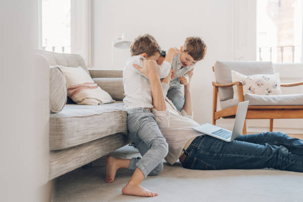 istock Father trying to work from home 1214199766