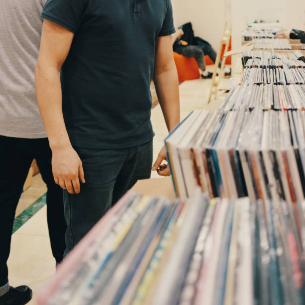 istock Stacks of vinyl records in the store 1214200090