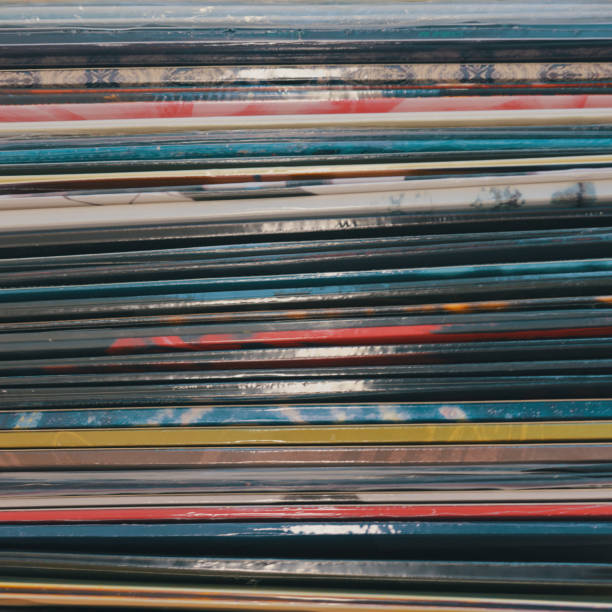 istock Stacks of vinyl records in the store 1214200110