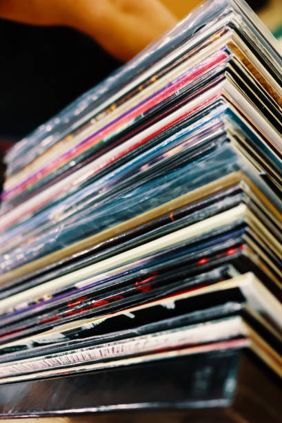istock Stacks of vinyl records in the store 1214200140