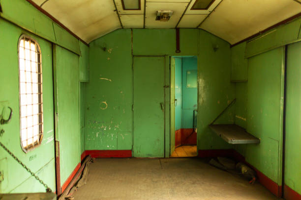 istock Interior of an old train carriage for transporting prisoners 1214203337