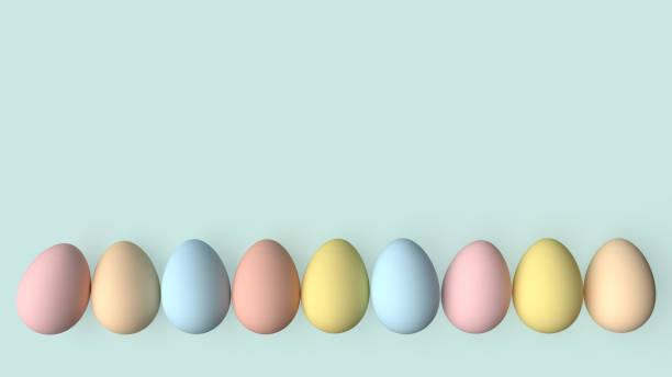 istock Easter eggs painted in pastel colors on a pastel green background. 1214205541