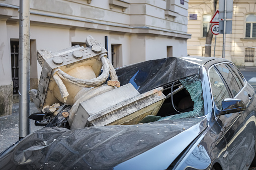 Zagreb, Croatia - March 22, 2020 : In the morning capital of Croatia, Zagreb has been hit by the magnitude of the earthquake 5.5 per Richter. Cars have been destroyed by fallen parts of the building.