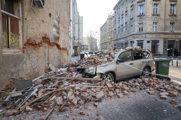 Zagreb hit by the earthquake destroyed cars Zagreb, Croatia - March 22, 2020 : In the morning capital of Croatia, Zagreb has been hit by the magnitude of the earthquake 5.5 per Richter. Cars have been destroyed by fallen parts of the building. zagreb earthquake stock pictures, royalty-free photos & images