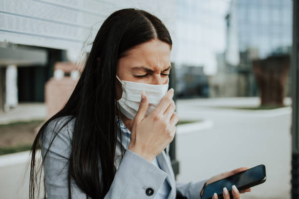 istock Virus infected woman with mask 1214219112