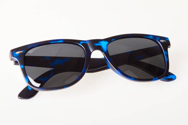 istock Black and blue stylish sunglasses in different positions isolated 1214221310