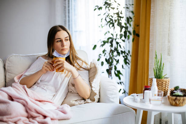 istock Sick woman having flu or cold. 1214221919