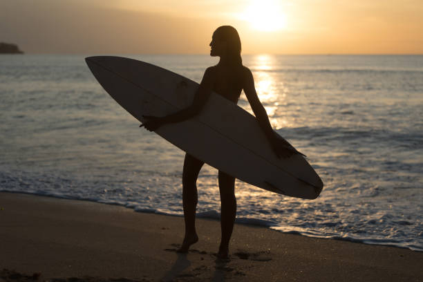 istock Surfer girl 1214222522