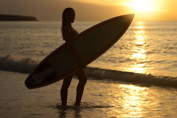 istock Surfer girl 1214222627