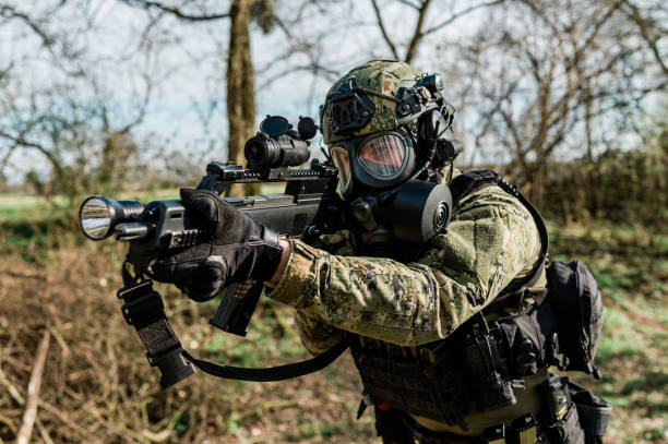 istock Soldier with gas mask 1214222967