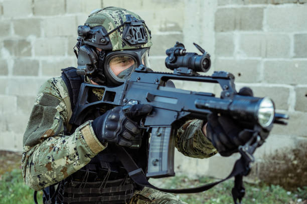 istock Soldier with gas mask 1214222979