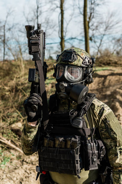 istock Soldier with gas mask 1214222984
