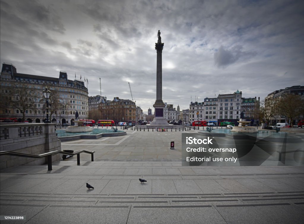 Deserted London landmarks Trafalgar Square in the heart of London - empty on a weekday morning, when it would normally be filled with tourists.
Iconic London locations empty at the start of the Corona Virus epidemic Coronavirus Stock Photo