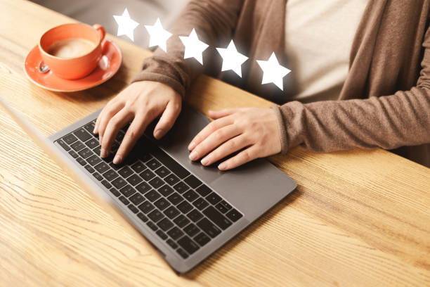 istock Young woman working with laptop while sitting in cafe 1214224215