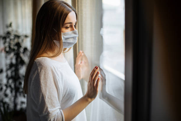 istock Woman in isolation at home for virus outbreak 1214224459