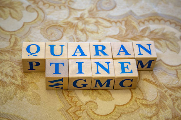 istock Quarantine. Wooden cubes with blue letters 1214225639