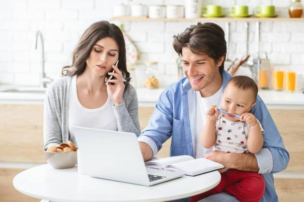 istock Partners spouses working from home, consulting clients online 1214225776