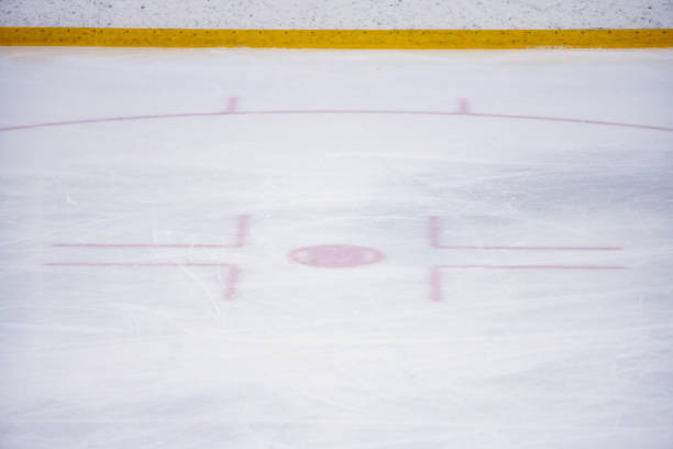 istock Ice hockey rink red centrla point lines. 1214226693