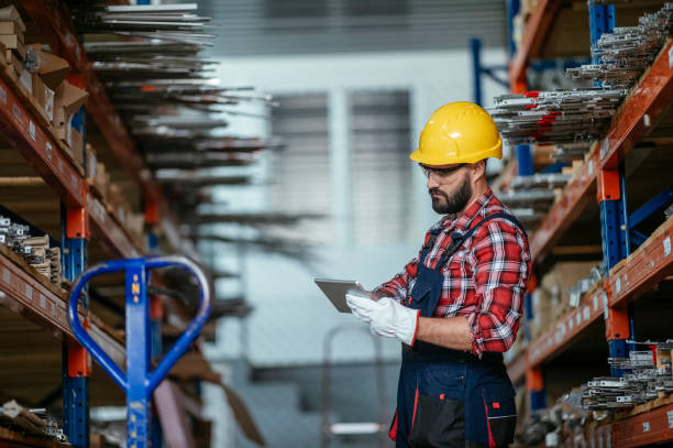 istock Factory worker in warehouse stock photo 1214227500