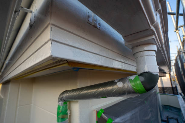 istock Exterior wall painting work.Scaffolding, Renovate housing construction. 1214227542