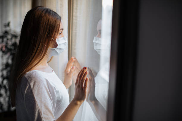 istock Woman in isolation at home for virus outbreak 1214228483