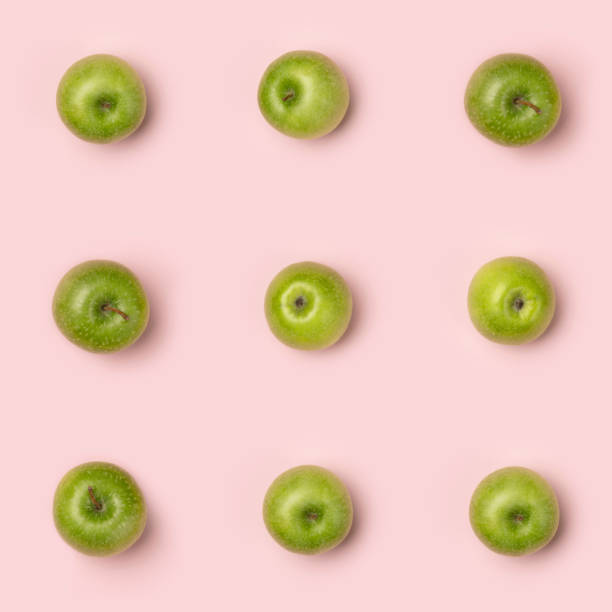 istock Apples pattern on pink background. Creative food concept. Flat la 1214235606