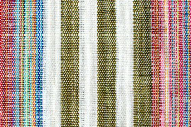 Background from vintage natural linen fabric. Flax texture. Striped colorful linen fabric. Canvas texture