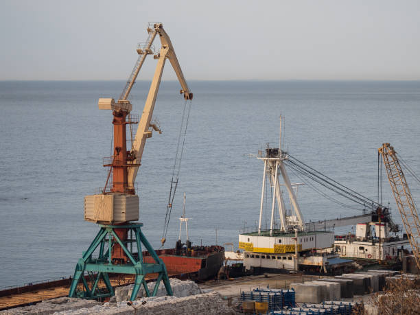 istock Cargo Cranes In The Seaport 1214236219