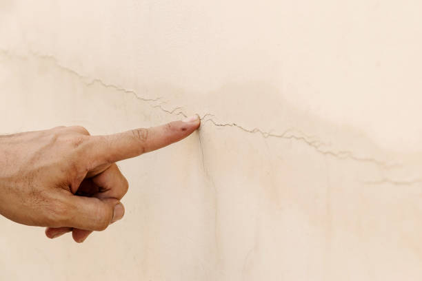 istock Crack in the concrete wall. 1214239505