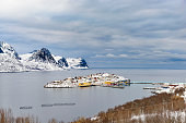 View on Husøy, Senja fishing village  in Øyfjorden in winter