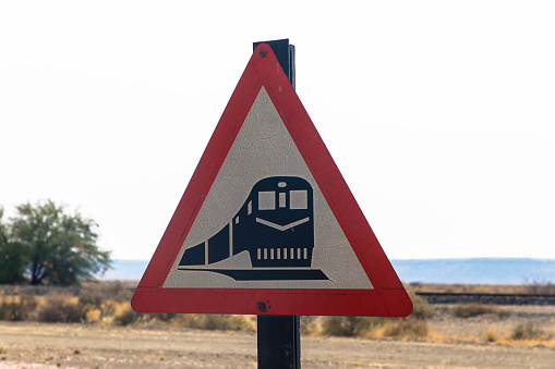 Road sign indicating a railway crossing. Attention train, namibia africa