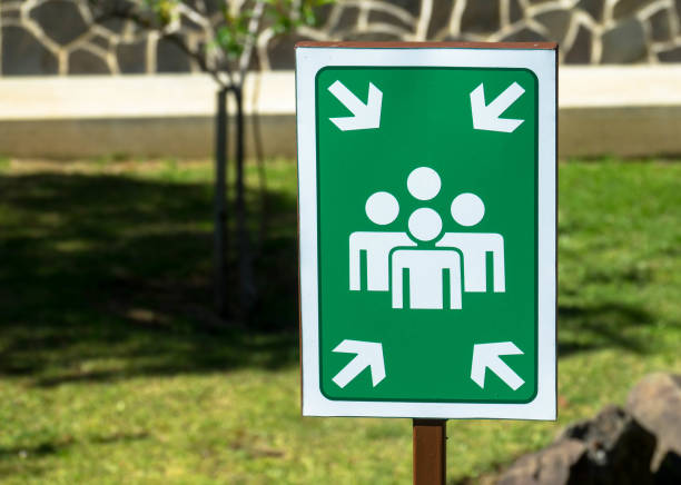 istock Sign board mentioning safe assembly area 1214243461