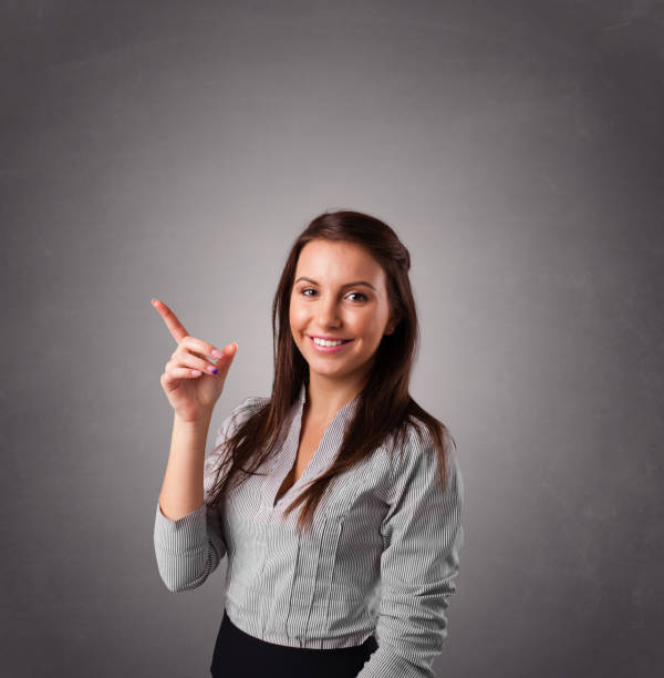 istock Young woman standing and thinking with copy space 1214243661