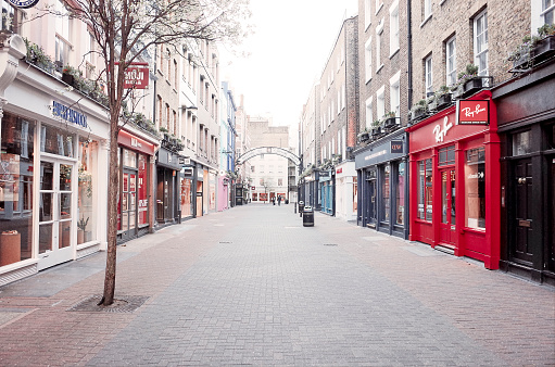 The streets of London, UK are almost completely empty following government advice for residents to stay at home and social distance. Most non-essential businesses have shut down.