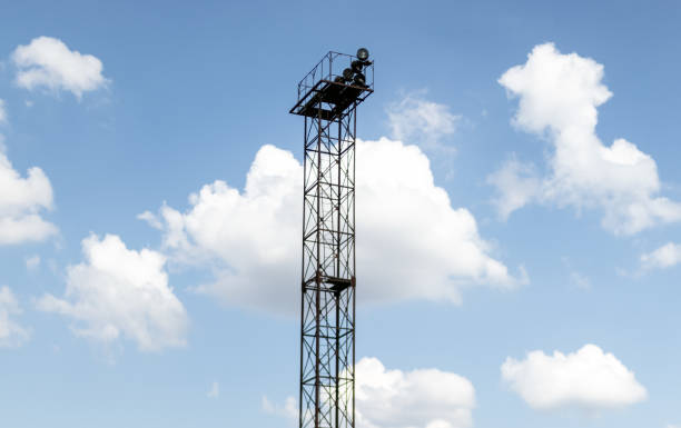 istock Tower with spotlights against the sky. 1214248497