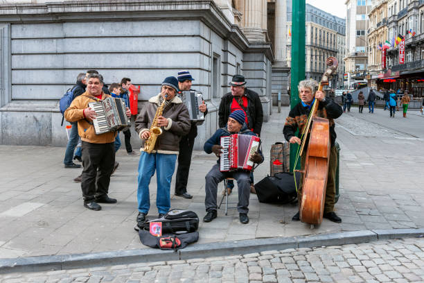 Street jazz band musicians with instruments in Brussels