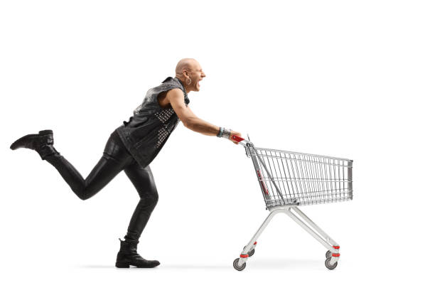 istock Punk running with an empty shopping cart 1214252915