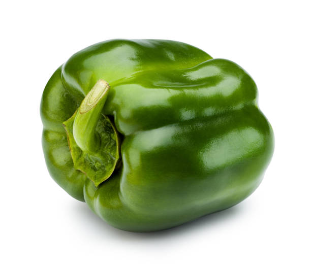 istock Green bell pepper isolated on white with clipping path. 1214254559