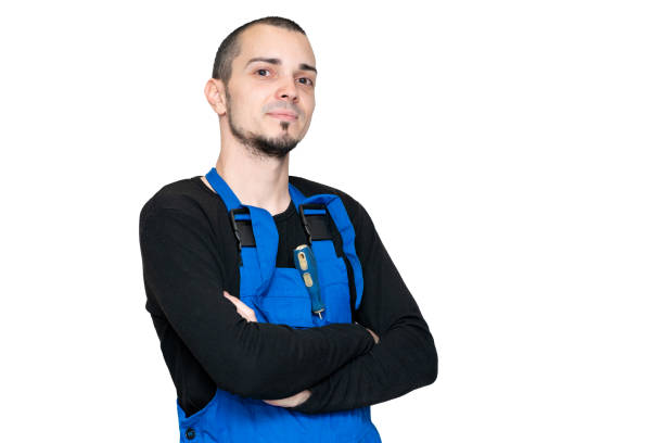istock Professional repair, installation and maintenance technician. In a work suit 1214255652