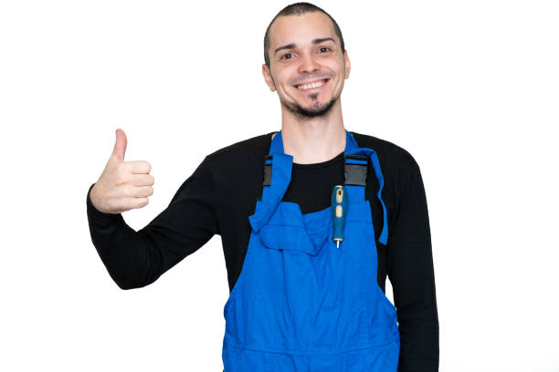 istock Professional repair, installation and maintenance technician. In a work suit 1214255688