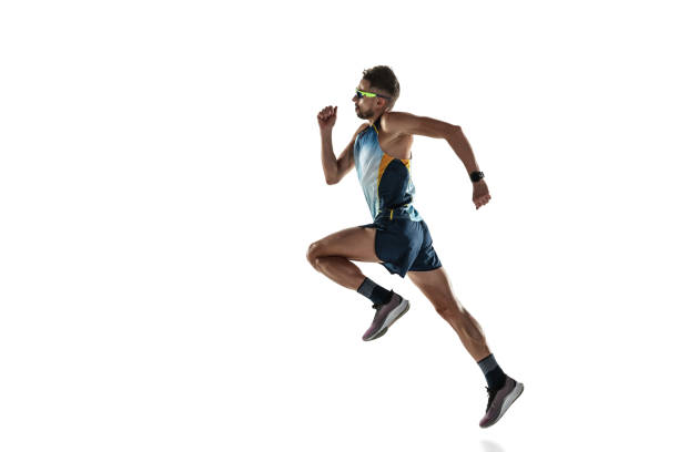 istock Triathlon male athlete running isolated on white studio background 1214259626