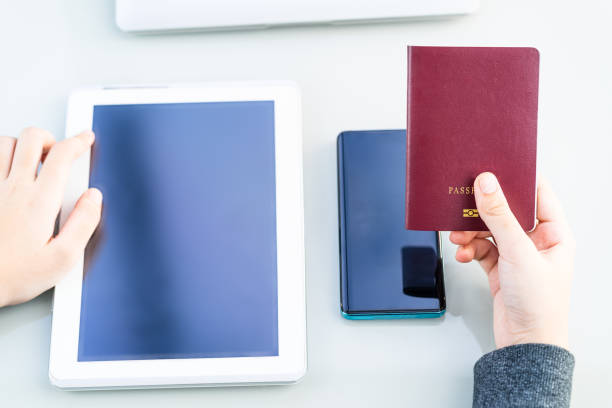 istock Close up of women hand holding tablet computer with blank copy space screen 1214260150