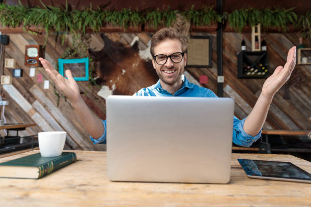 istock casual man greeting happy with arms open 1214263525
