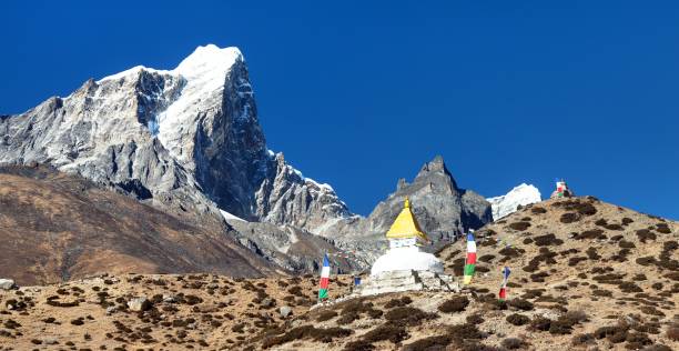istock Tabuche Peak and stupa on the way to Everest base camp 1214266060