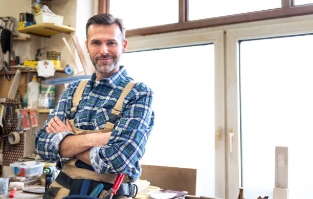 istock Portrait of middle aged carpenter in the carpentry workshop 1214268222